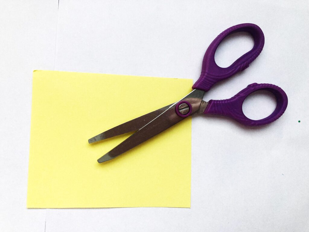 Scissors with yellow rectangle