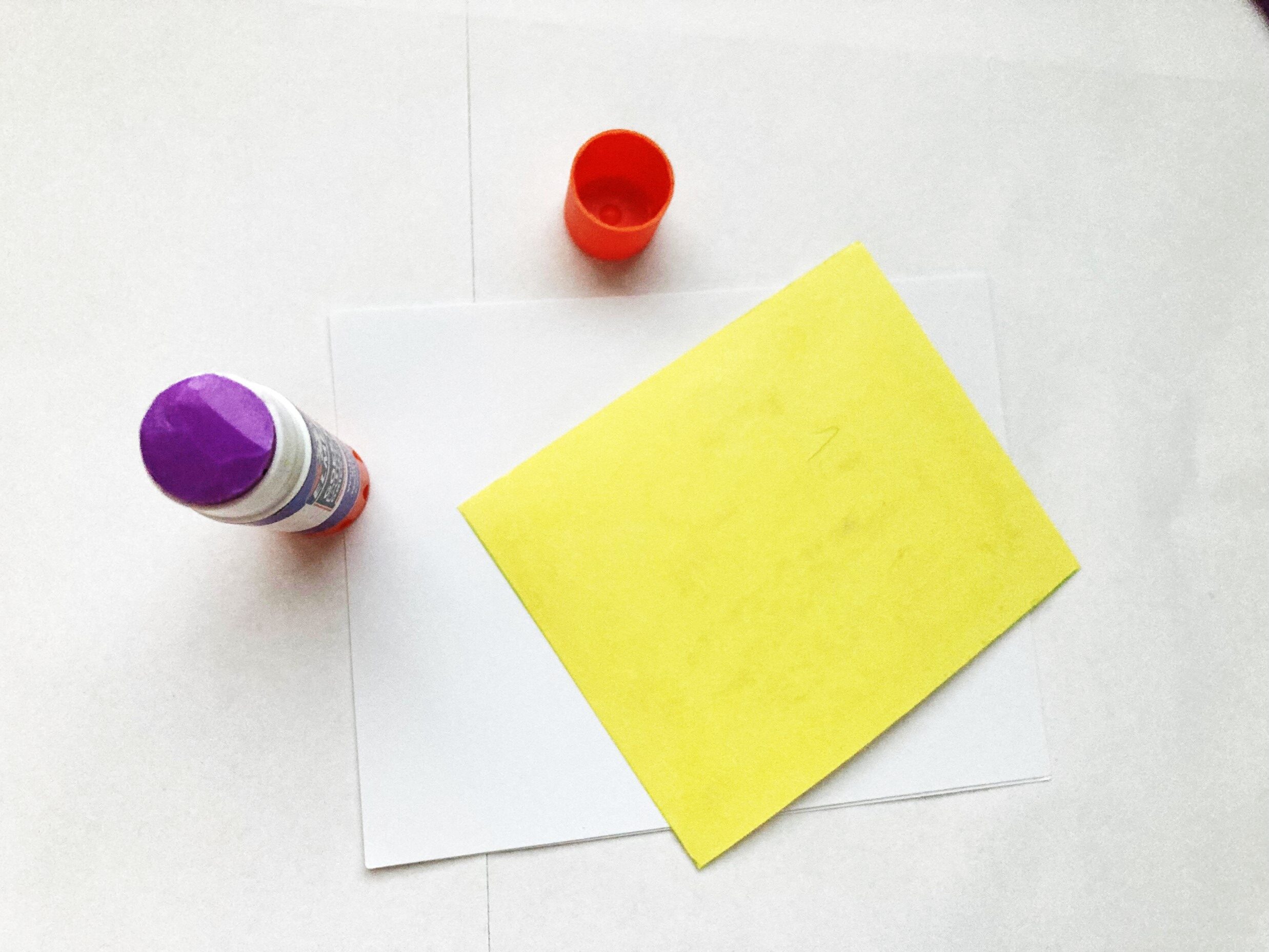 Yellow cardstock rectangle with open glue stick